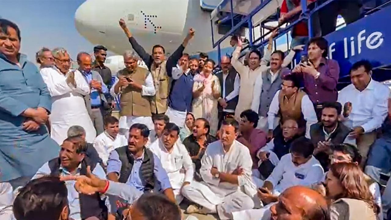 Congress leaders stage a protest dharna at the IGI Airport after the party leader Pawan Khera was allegedly deboarded from the plane, in New Delhi, Thursday, Feb. 23, 2023. Credit: PTI Photo