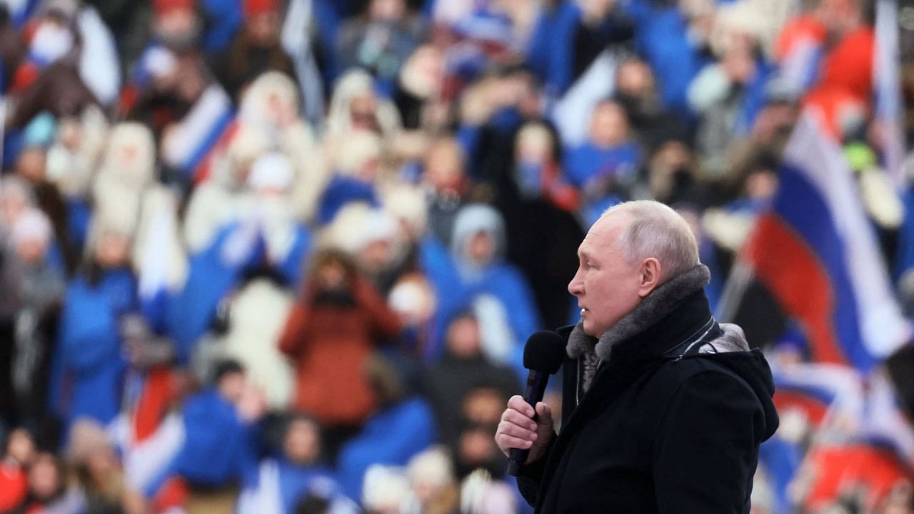 Russian President Vladimir Putin attends a patriotic concert dedicated to the upcoming Defender of the Fatherland Day at the Luzhniki stadium in Moscow on February 22, 2023. Credit: AFP Photo