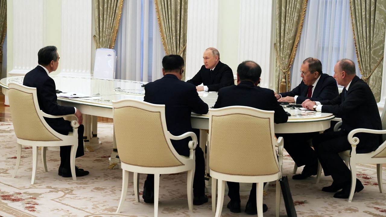 Russia's President Vladimir Putin attends a meeting with China's Director of the Office of the Central Foreign Affairs Commission Wang Yi in Moscow, Russia February 22, 2023. Credit: Reuters Photo