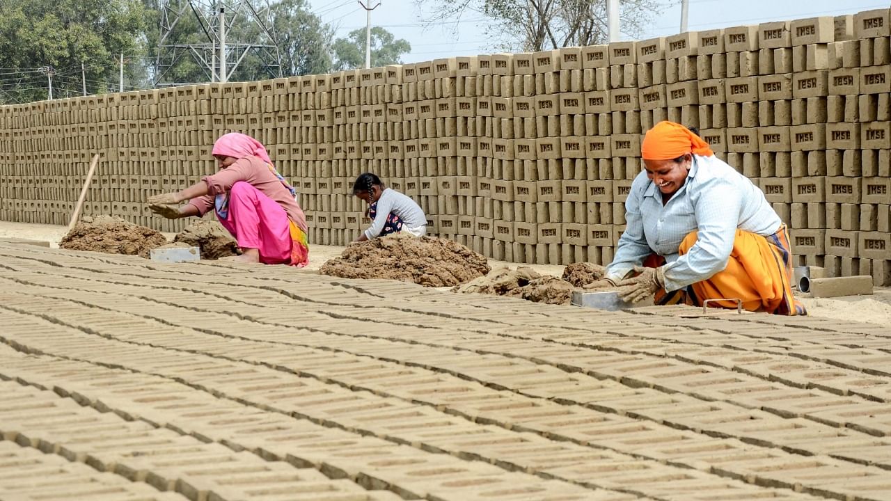 Women work at a brick kiln on the outskirts of Amritsar. Credit: PTI File Photo