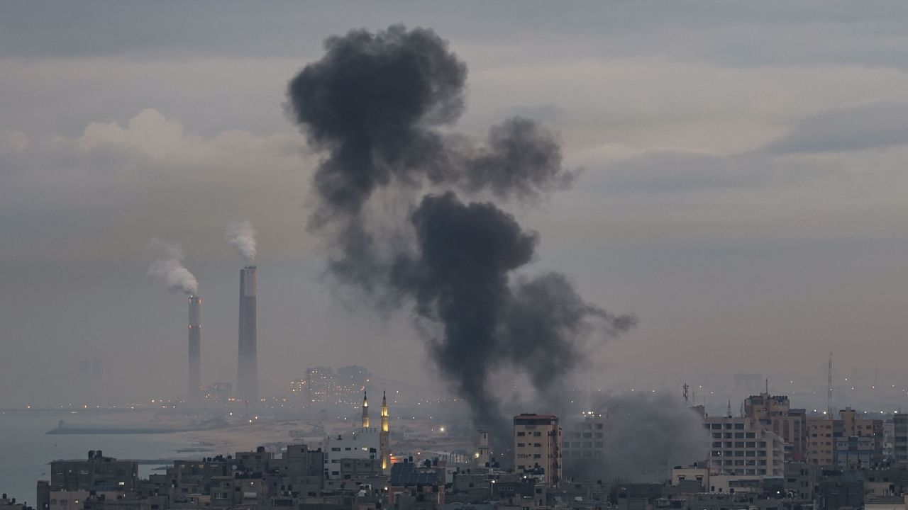 Smoke rises above buildings in Gaza City as Israel launched air strikes on the Palestinian enclave early on February 23, 2023. Credit: AFP Photo