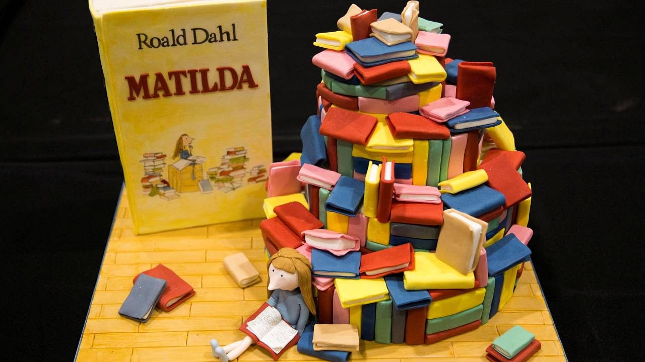 A cake decorated in the style of the Roald Dahl children's book 'Matilda' is displayed at the Cake and Bake show in London. Credit: Reuters Photo