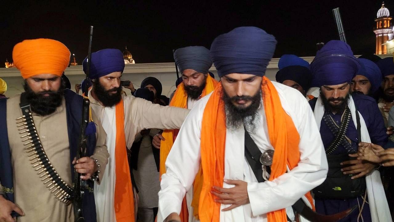 Amritpal Singh with his associate Lovepreet Toofan visits Golden Temple after the latter's release from the Amritsar Central Jail. Credit: IANS Photo