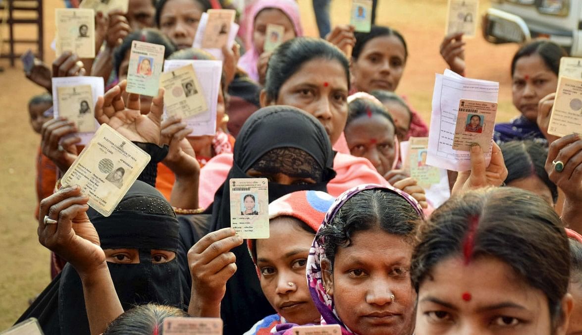 <div class="paragraphs"><p>Representative image showing women standing in a queue, waiting for their turn to caste their votes.</p></div>