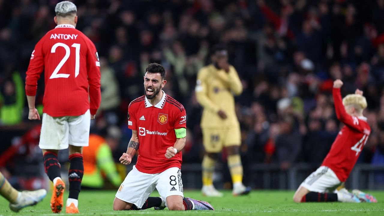 Manchester United players celebrate after the match. Credit: Reuters Photo