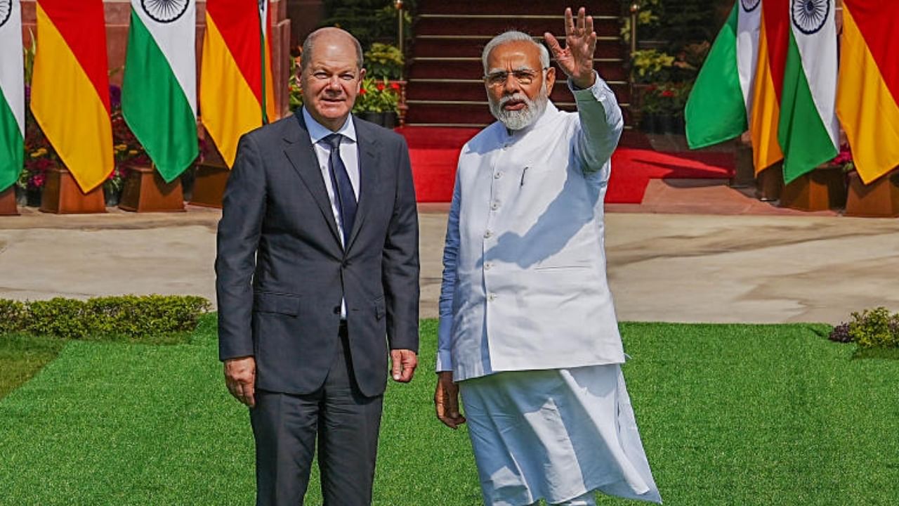 Prime Minister Narendra Modi with German Chancellor Olaf Scholz. Credit: PTI Photo