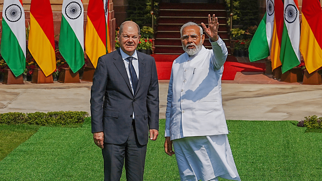 Prime Minister Narendra Modi with German Chancellor Olaf Scholz. Credit: PTI Photo