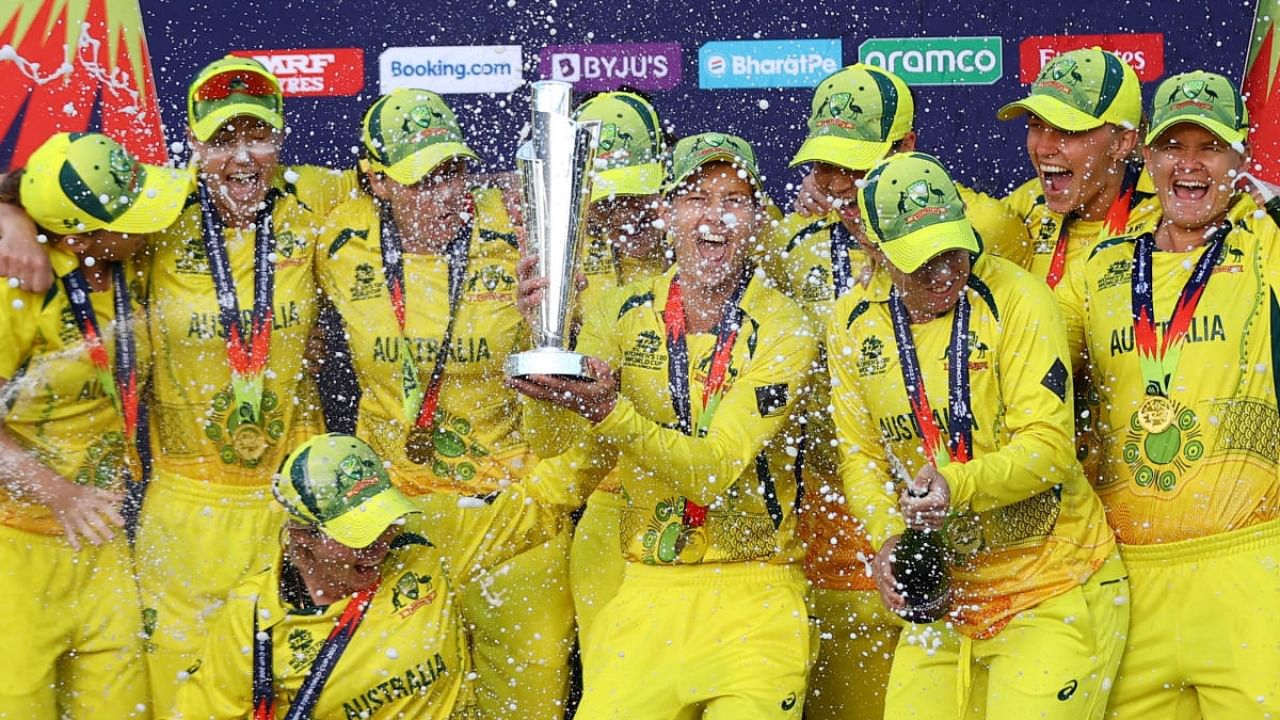 Australia's Meg Lanning celebrates with the trophy and teammates after winning the ICC Women’s Cricket T20 World Cup. Credit: Reuters Photo