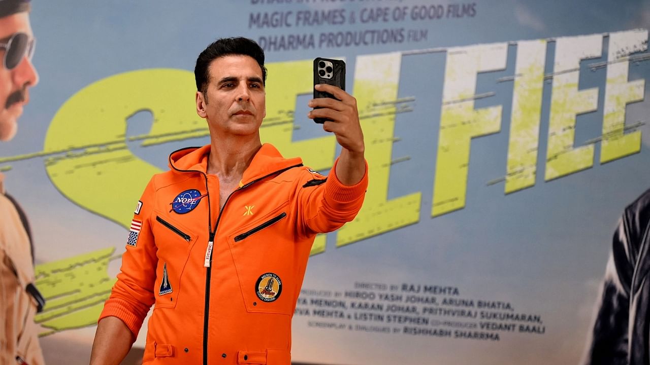 Bollywood actor Akshay Kumar takes a selfie during the promotion of his upcoming film 'Selfiee' in Mumbai on February 22, 2023. Credit: AFP Photo