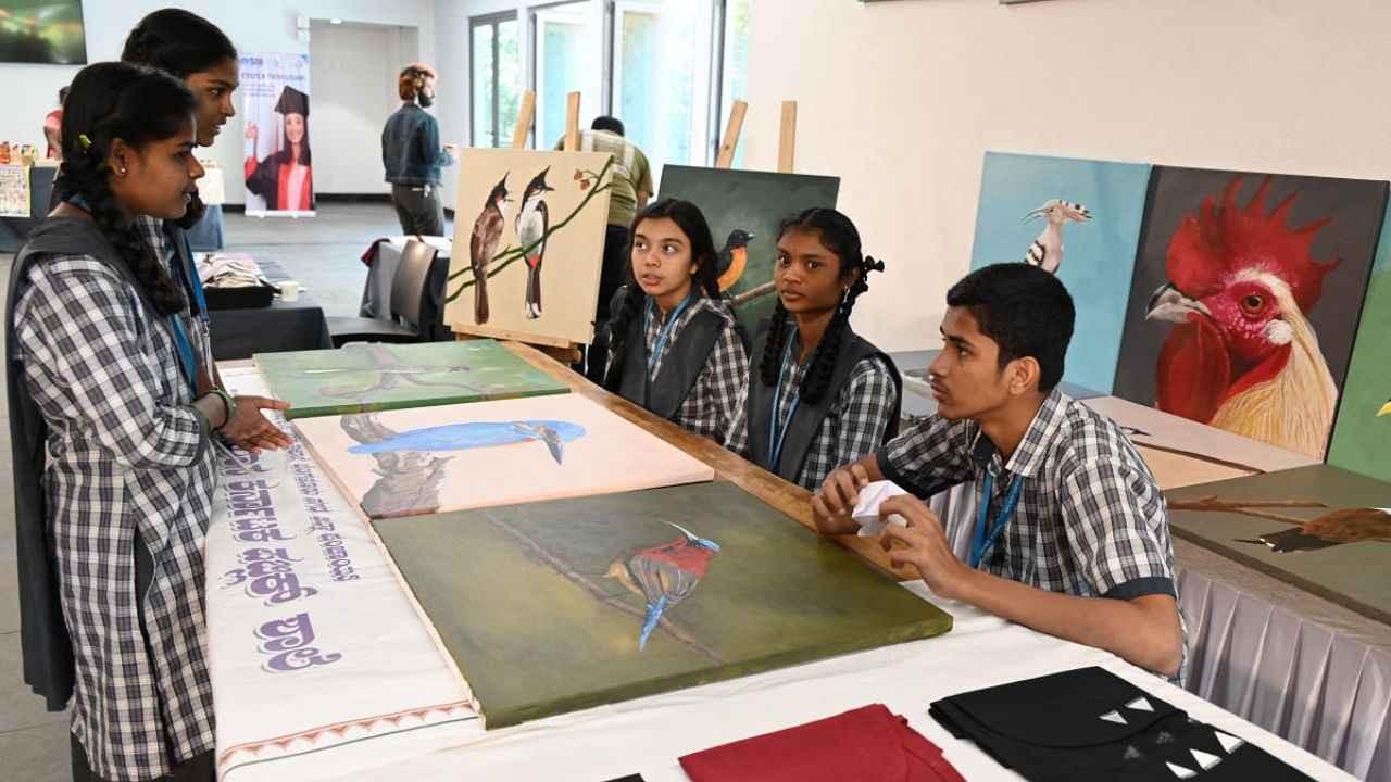 Students at an exhibition stall at the BIC Hub'ba in Bengaluru on Saturday. Credit: DH Photo/B K Janardhan