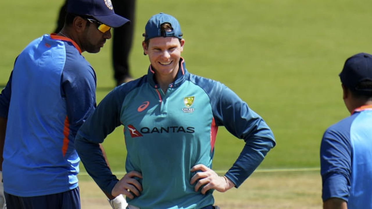 Steve Smith with Rahul Dravid and Ravichandran Ashwin during a practice session ahead of the 3rd test cricket match between India and Australia, at Holkar Cricket Stadium in Indore. Credit: PTI Photo