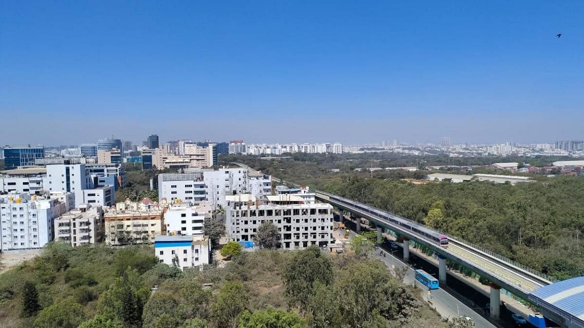 A metro train plies on the elevated track on ITPL Main Road during the recent trial run of the KR Puram-Whitefield line. Credit: Special arrangement
