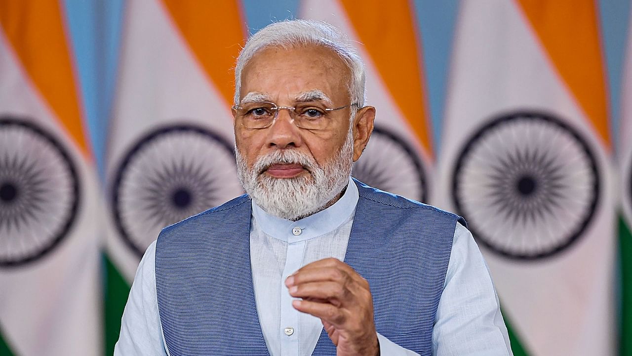 PM Modi addressing a webinar. Credit: PTI Photo