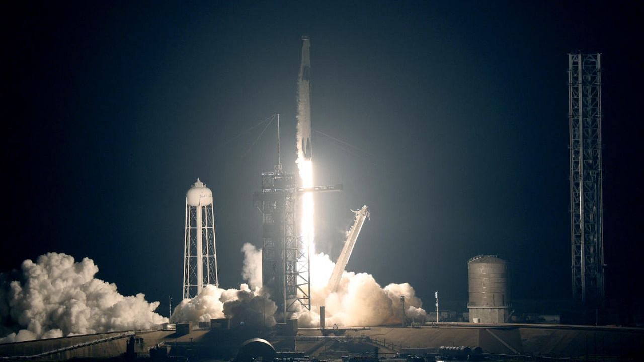 SpaceX Falcon 9 rocket with the Crew Dragon spacecraft lifts off from launch pad 39A at the Kennedy Space Center. Credit: Getty images via AFP Photo