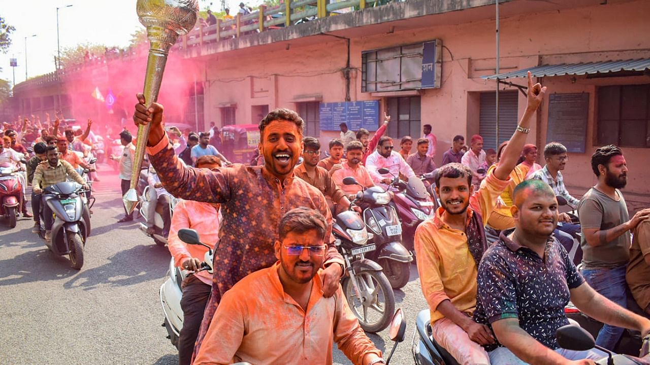 Congress candidate Ravindra Dhangekar's supporters celebrate his victory in the Kasba Peth Assembly bypoll, Pune. Credit: PTI Photo