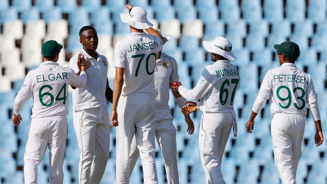 South Africa's Kagiso Rabada celebrates with teammates after the dismissal of West Indies' Kemar Roach. Credit: AFP Photo
