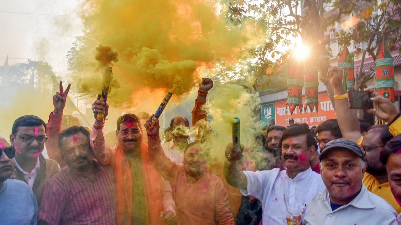 BJP workers celebrate the party's victory in Tripura and Nagaland Assembly elections. Credit: PTI Photo