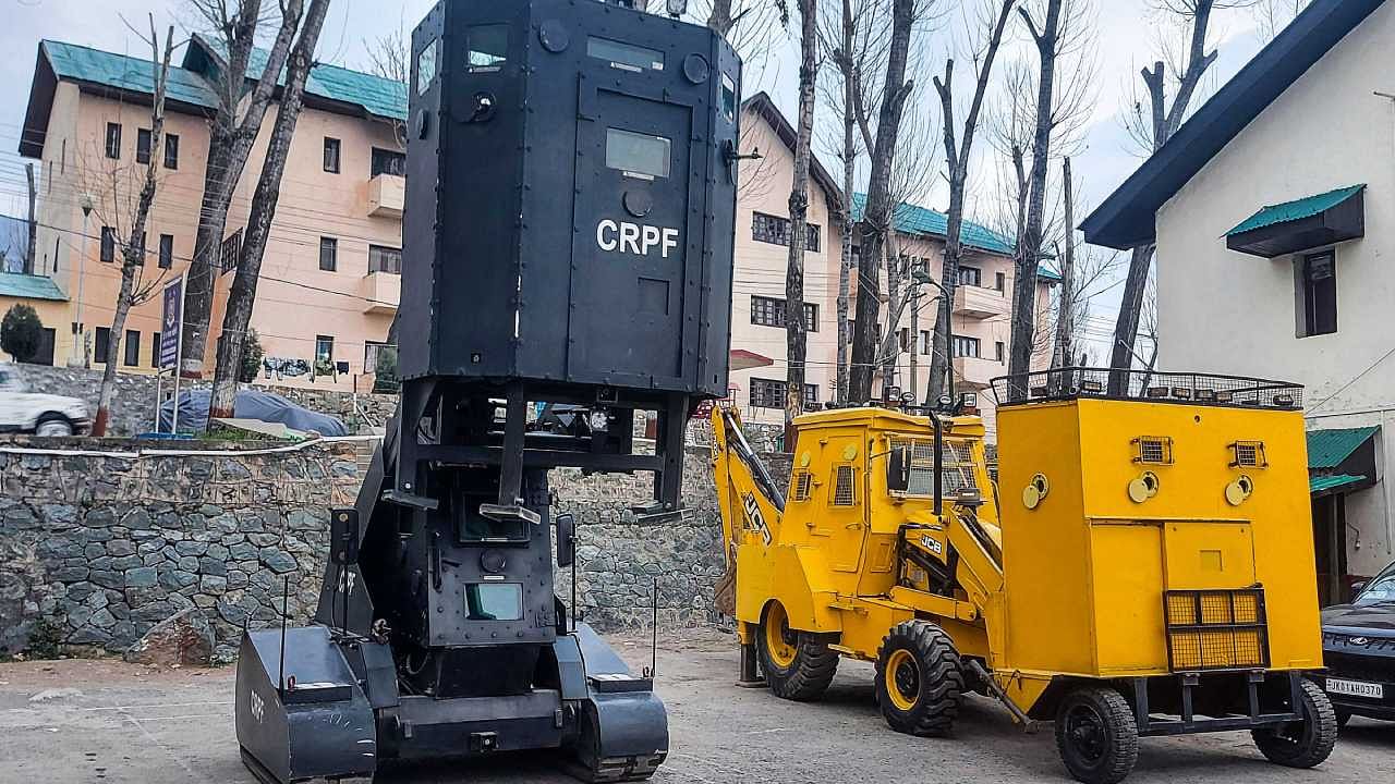 Bullet proof JCB and CSRV used by CRPF in counter insurgency operations in Kashmir. Credit: PTI Photo