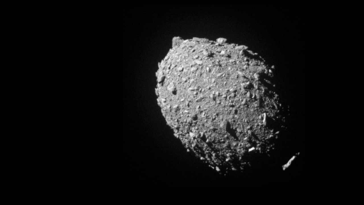 Smashing head on into Dimorphos at 13,000 miles per hour, the DART impactor blasted over 1,000 tons of dust and rock off of the asteroid. Credit: Reuters File Photo