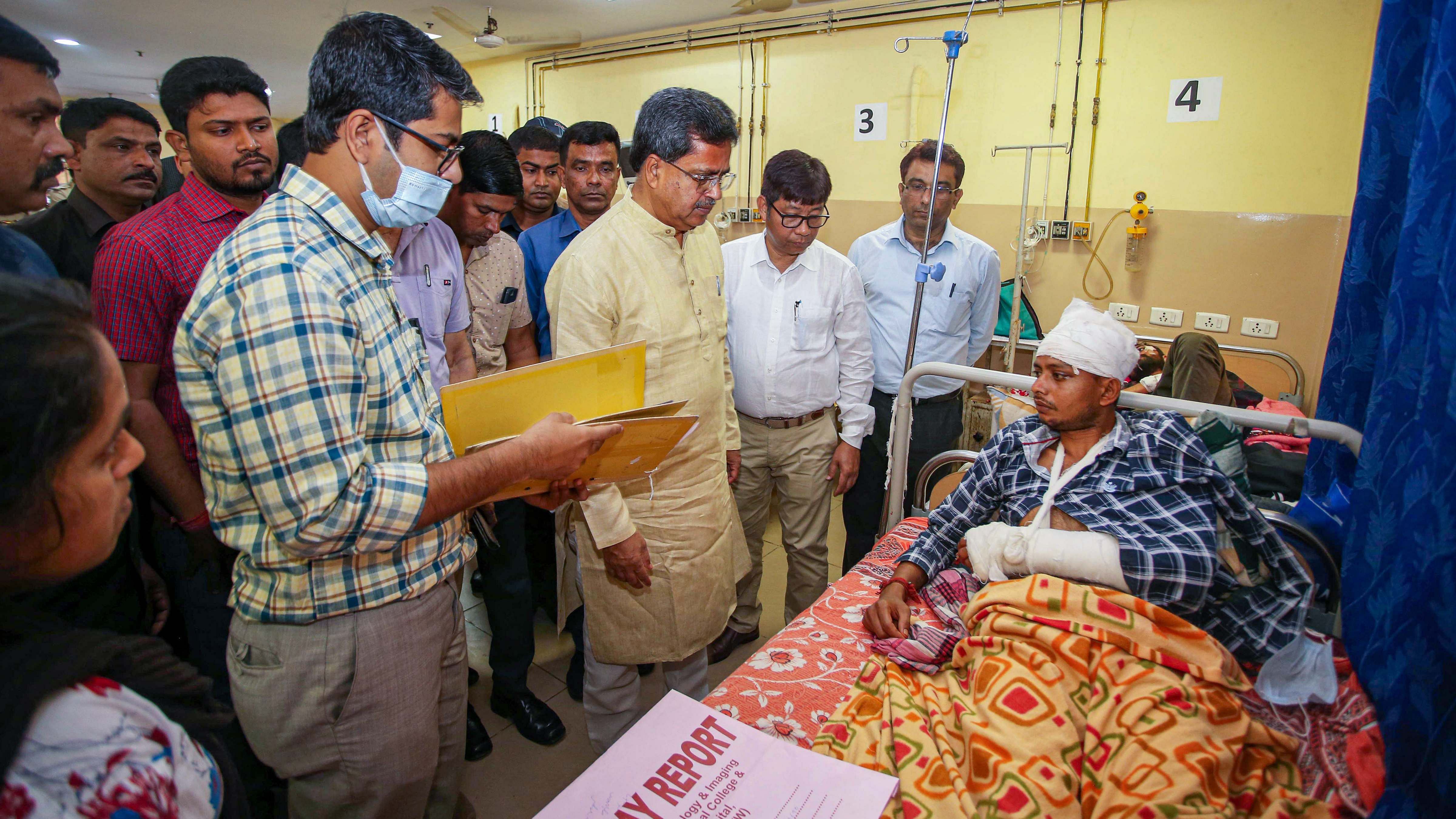 Tripura Chief Minister Manik Saha visits injured BJP party workers at a hospital a day after the party's victory in the Assembly elections, in Agartala, Friday, March 3, 2023. Credit: PTI Photo