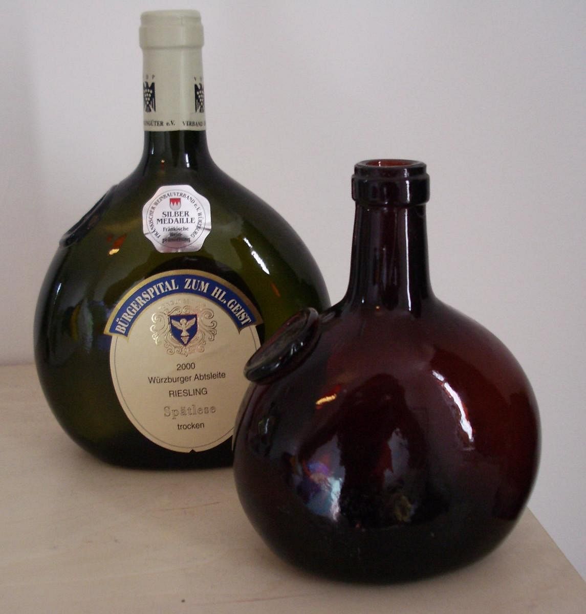 German wine from Franken in the characteristic round bottles (Bocksbeutel). PIC COURTESY WIKIPEDIA