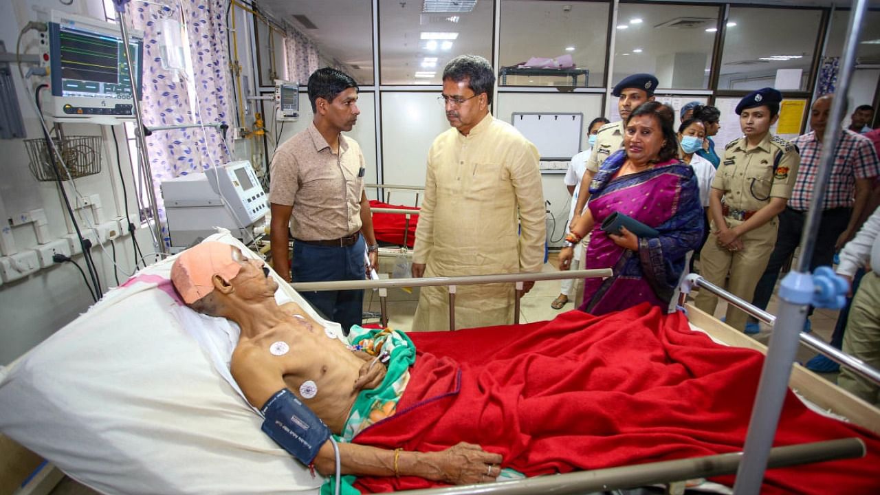 Caretaker CM Manik Saha visits injured BJP party workers at a hospital in Tripura's capital. Credit: PTI File Photo