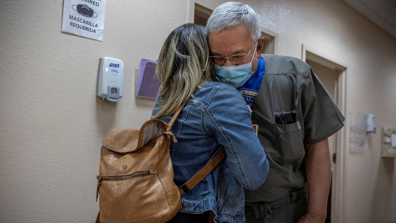 Dr. Franz Theard says goodbye to a patient at his abortion clinic, Women's Reproductive Clinic of New Mexico, in Santa Teresa, US, January 13, 2023. The abortion clinic in New Mexico is less than a mile from Texas, where abortion is illegal since the landmark legal case Roe v. Wade. Credit: Reuters File Photo
