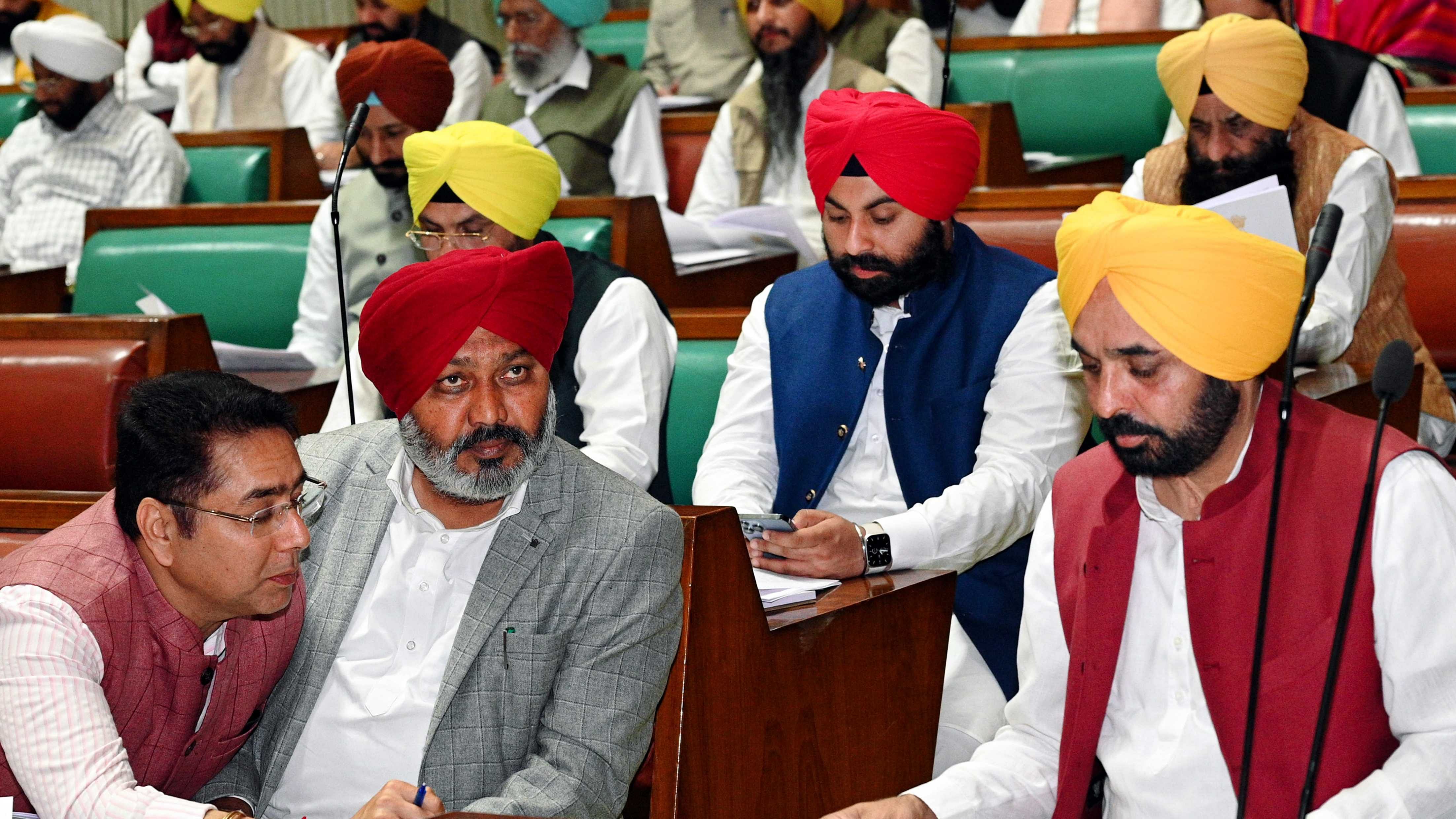 Punjab Chief Minister Bhagwant Mann and Punjab Finance Minister Harpal Singh Cheema in the Punjab Legislative Assembly on the first day of the Budget Session. Credit: PTI File Photo