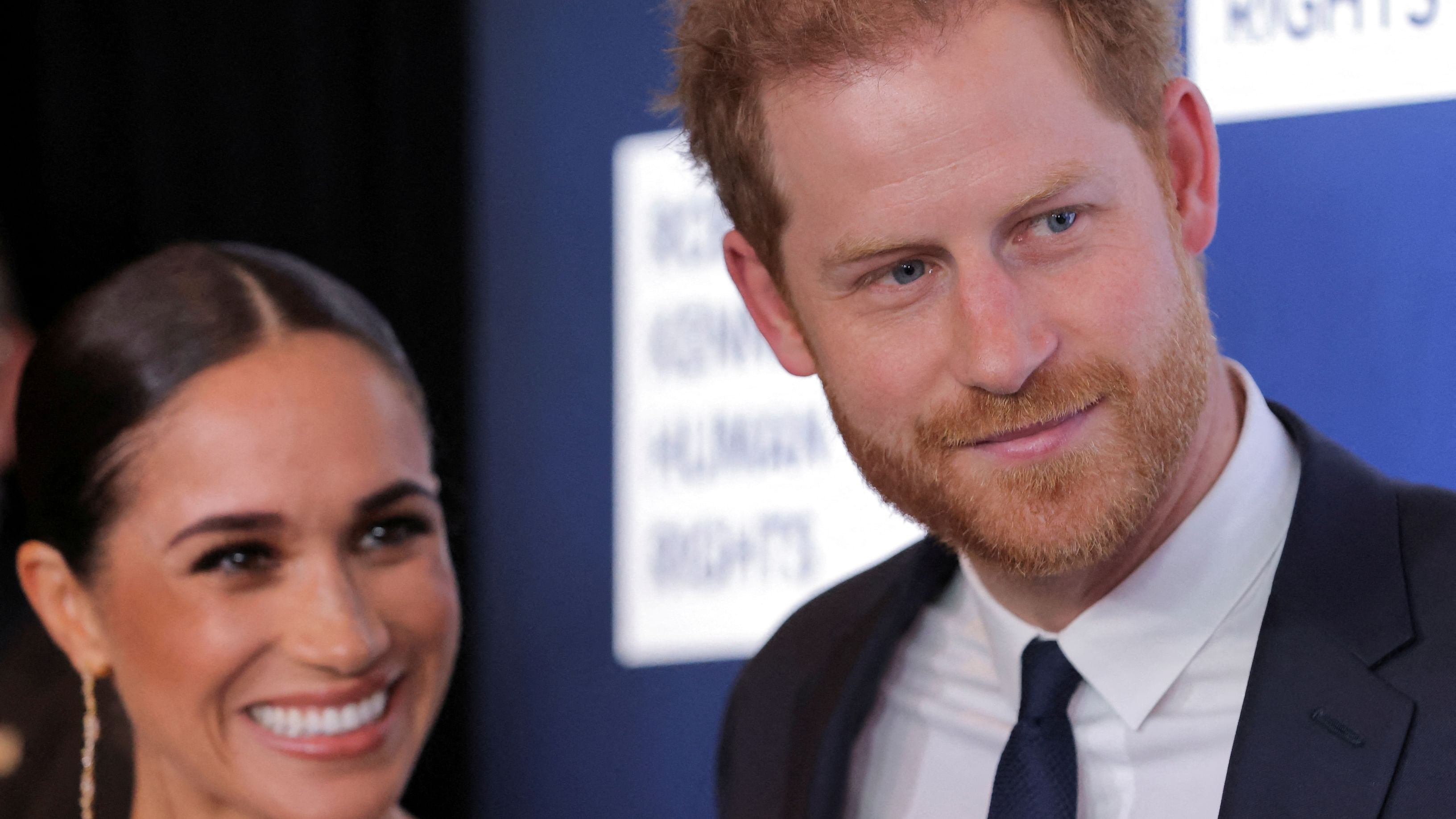 Prince Harry (R) and wife Meghan Markle (L). Credit: Reuters File Photo