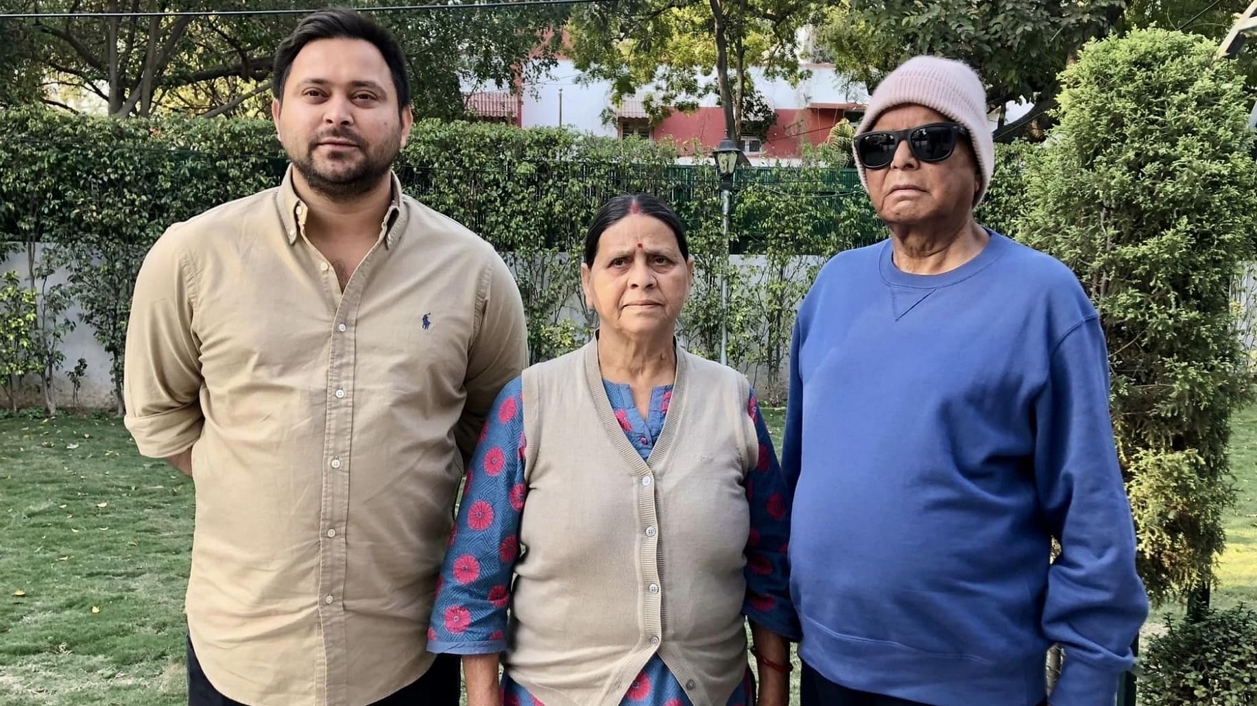 RJD chief Lalu Prasad Yadav with wife Rabri Devi and son Tejashwi yadav after the kidney transplant. Credit: IANS Photo