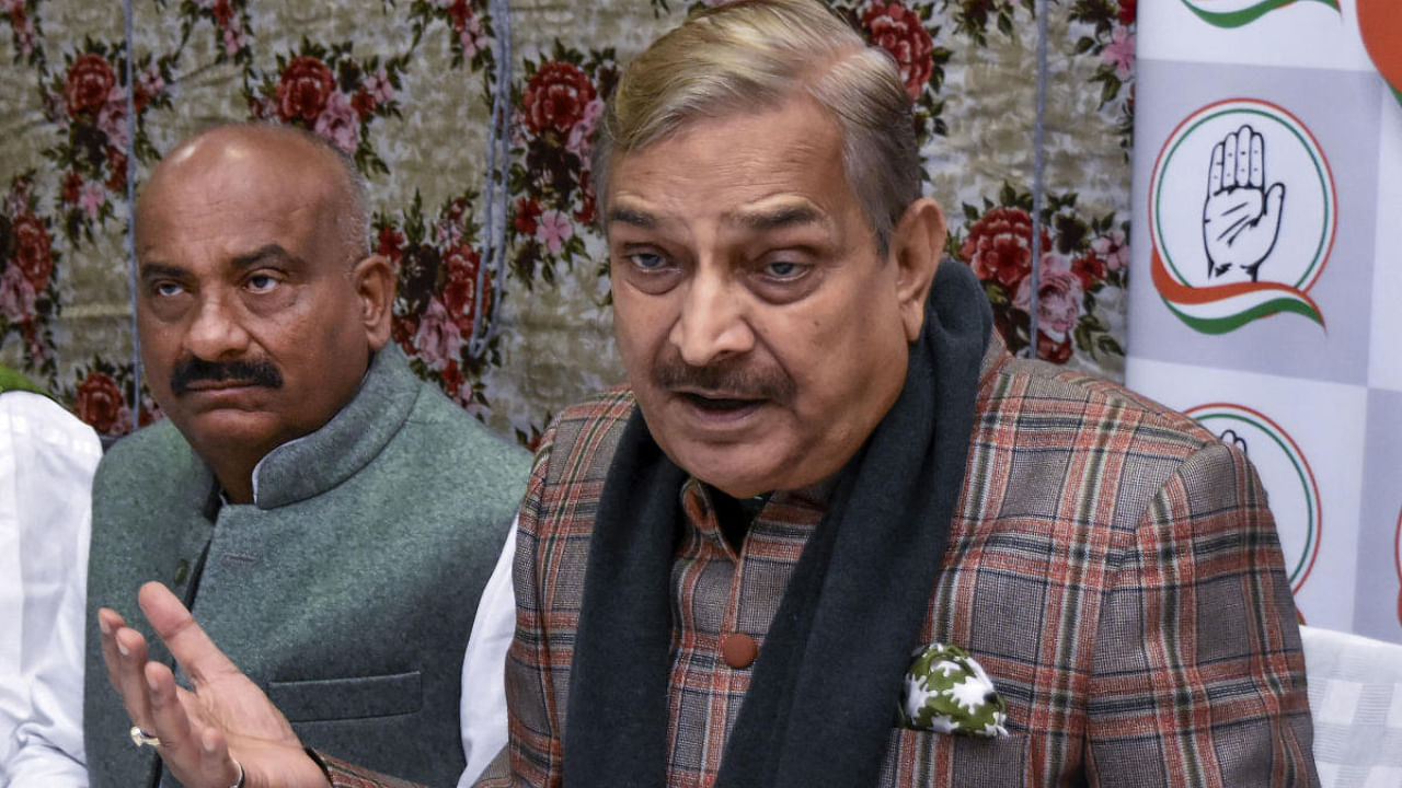 Pramod Tiwari (right). Credit: PTI Photo