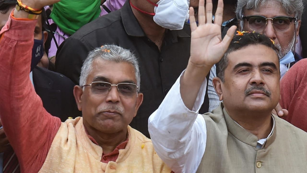 TMC wants BJP's Suvendu Adhikari and Dilip Ghosh to be probed in the SSC job scam. Credit: PTI File Photo