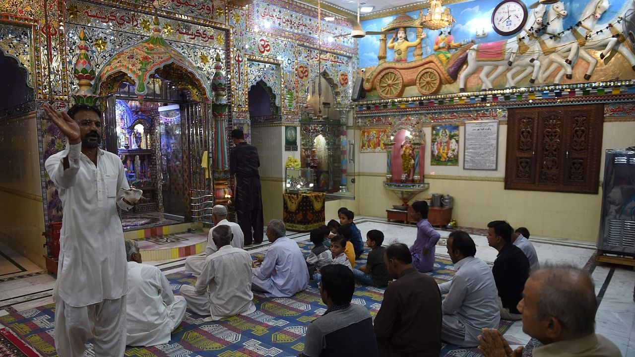 In this picture taken on May 24, 2018, Pakistani Hindus pray at the Shri Krishna Temple in Mithi, some 320 kilometers from Karachi. Credit: AFP File Photo