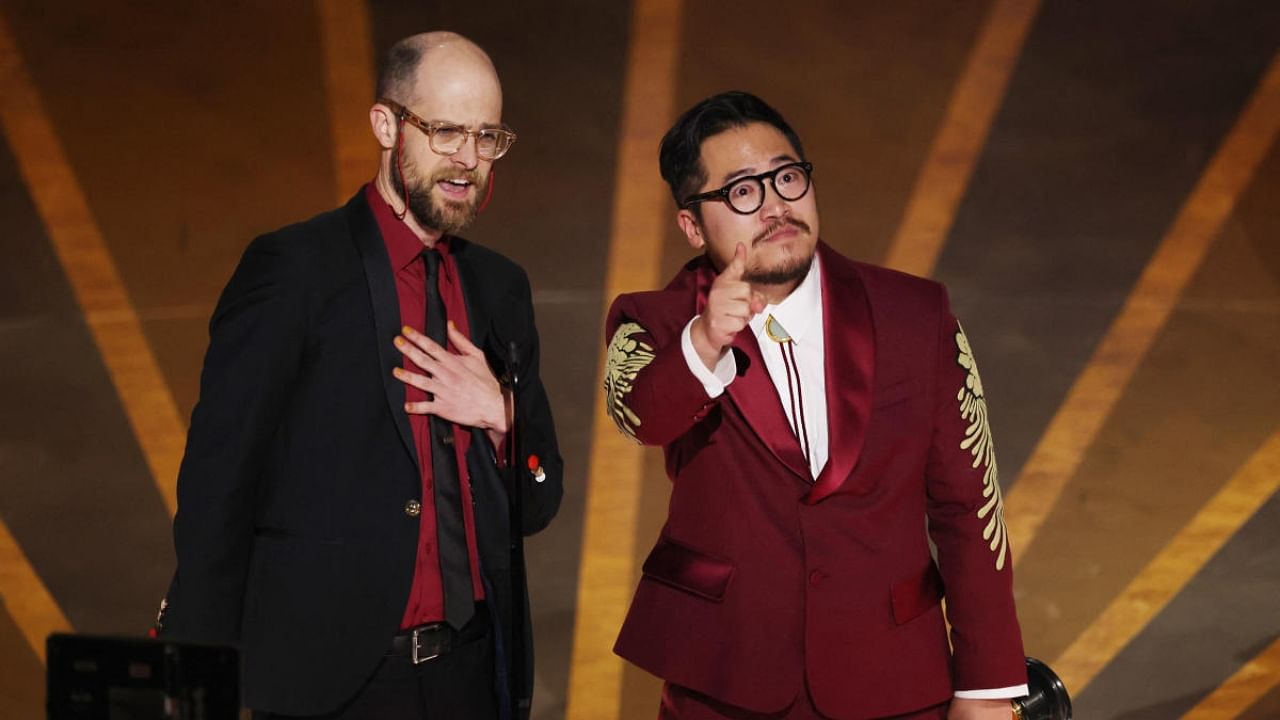 Daniel Kwan and Daniel Scheinert win the Oscar for Best Director for "Everything Everywhere All at Once" during the Oscars show at the 95th Academy Awards in Hollywood. Credit: Reuters Photo