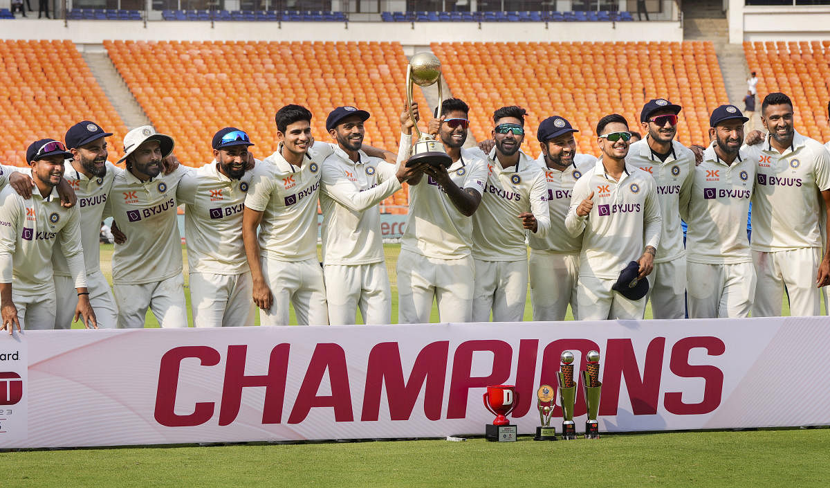 India pose with the Border-Gavaskar Trophy after the final Test ended in a dull draw. PTI Photo