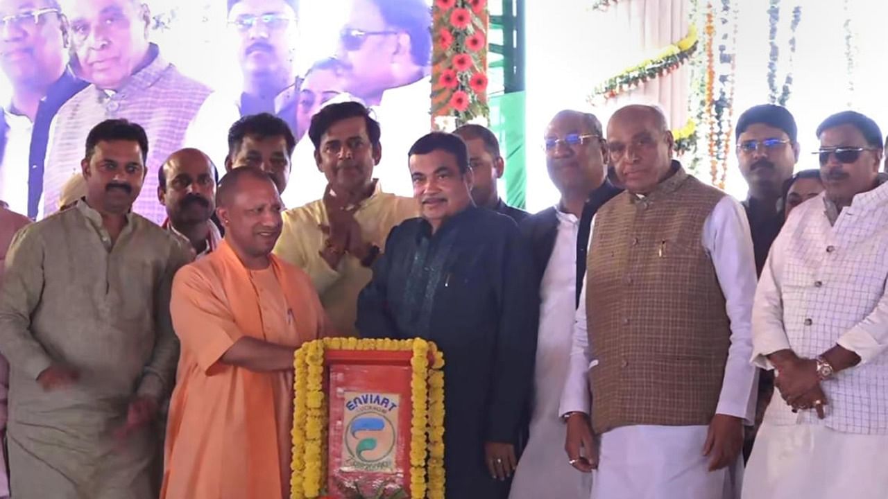 Nitin Gadkari with UP CM Adityanath and others during the inauguration of 18 National Highway projects, in Gorakhpur. Credit: PTI Photo