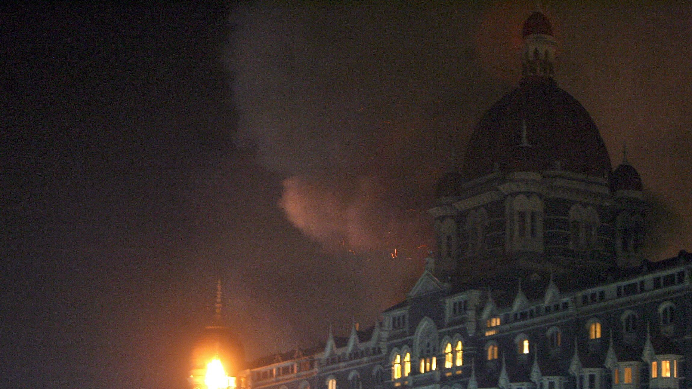 In this file photo taken on November 26, 2008 fire and smoke is seen during an attack at the Taj Mahal Palace hotel in Mumbai. Credit: AFP Photo