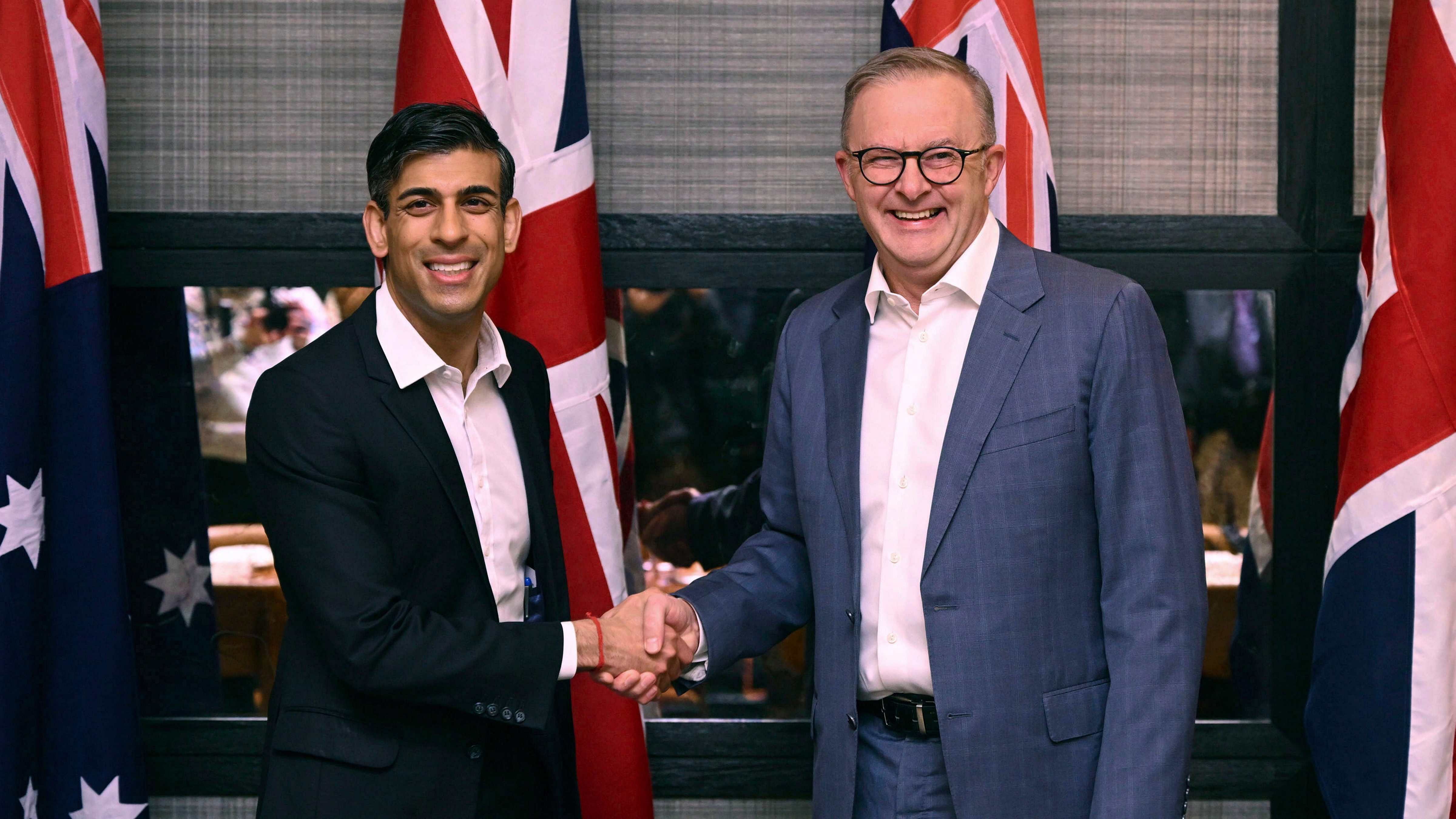 British Prime Minister Rishi Sunak, left, shakes hands with Australia's Prime Minister Anthony Albanese, in the Lionfish seafood restaurant, in San Diego. Credit: AP Photo
