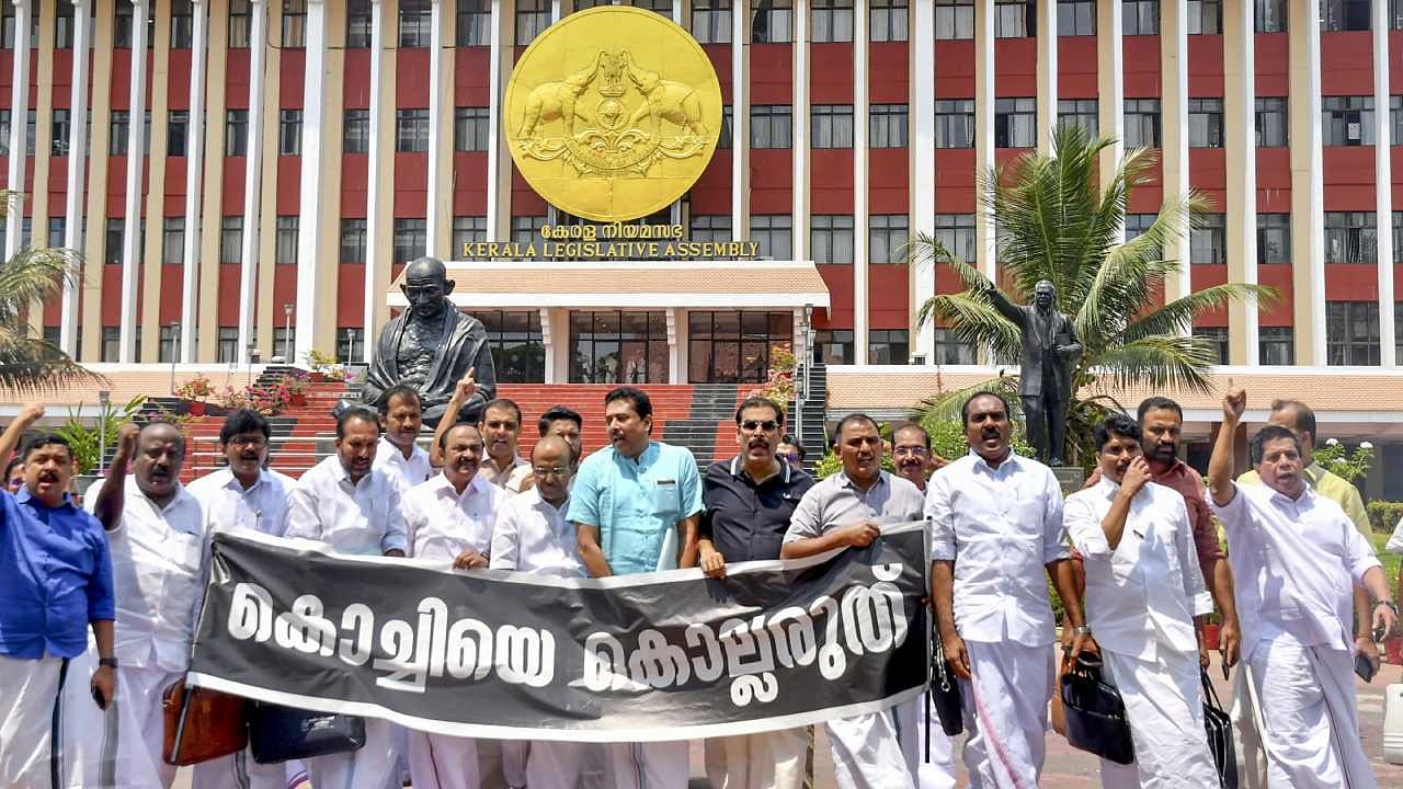 Opposition MLAs led by Leader of the Opposition V D Satheesan stage a walkout from the Kerala Legislative Assembly protesting against the fire at Brahmapuram Waste Treatment Plant. Credit: PTI Photo