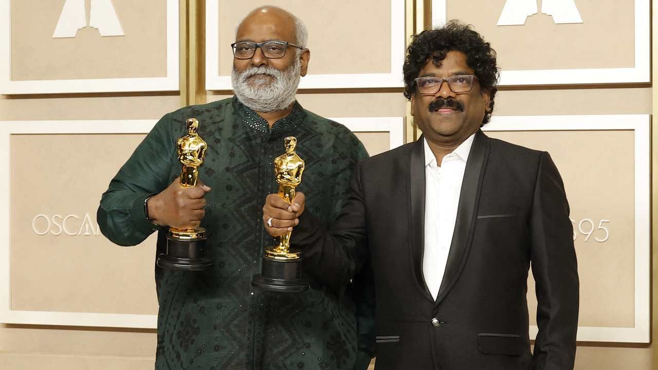 M M Keeravani and Chandrabose, winners of the Best Original Song award for "RRR," poses in the press room during the 95th Annual Academy Awards. Credit: Getty Images via AFP