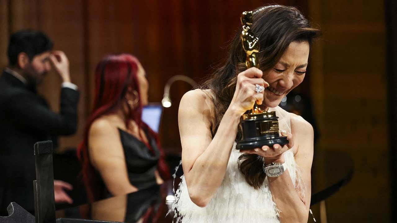 Best actress Michelle Yeoh reacts after having her Oscar engraved at the Governors Ball following the Oscars show at the 95th Academy Awards in Hollywood. Credit: Reuters Photo