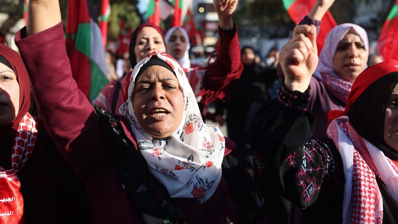 Palestinian supporters of the Democratic Front for the Liberation of Palestine (PFLP), take part in a march to denounce the killing of Palestinians by the Israeli army in Nablus and to support Palestinians in Israeli jails, in Gaza City, on February 22, 2023. Credit: AFP File Photo