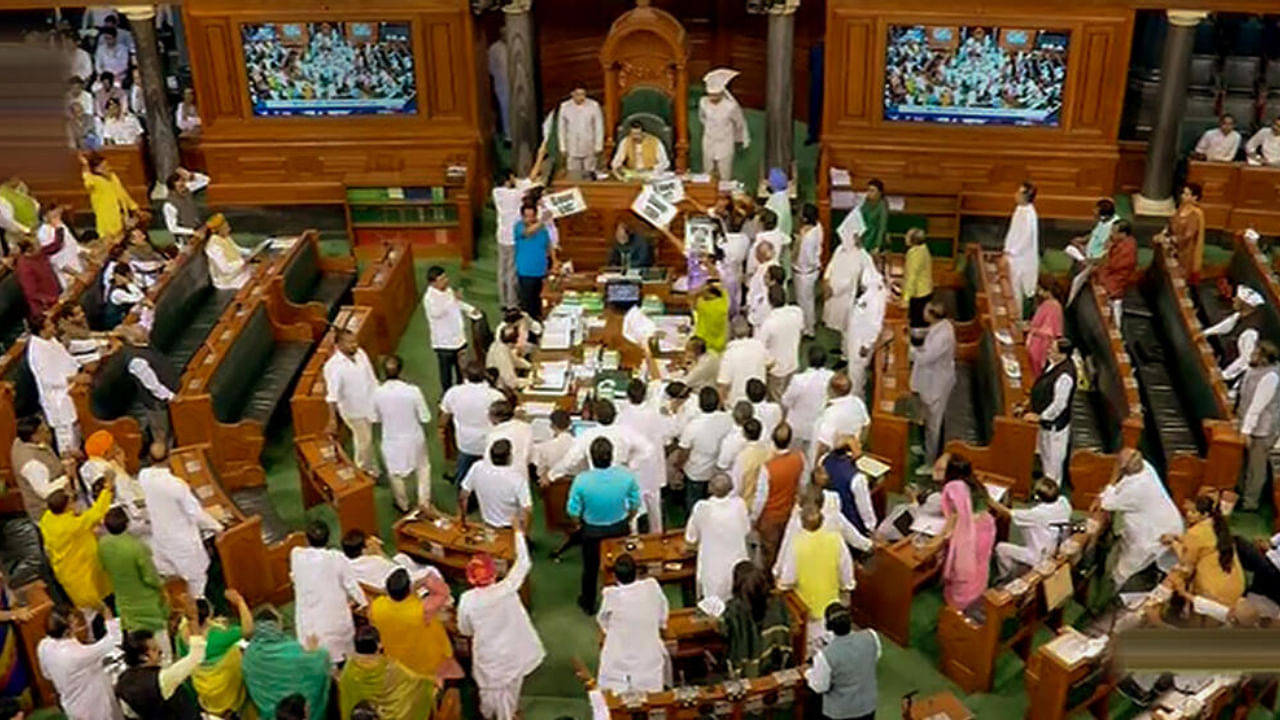BJD's Bhartruhari Mahtab conducts proceedings in the Lok Sabha amid a protest by opposition MPs during ongoing Budget Session of Parliament. Credit: PTI Photo