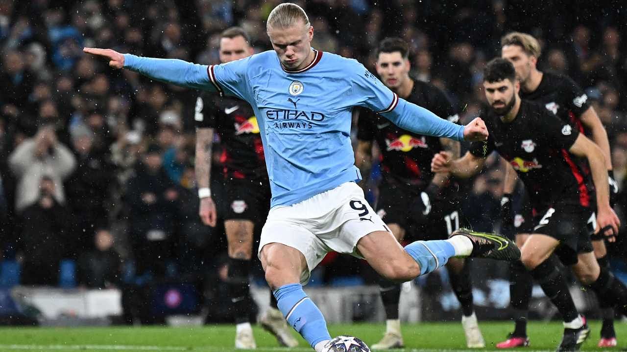 Manchester City's Norwegian striker Erling Haaland shoots from the penalty spot to score the team's opening goal during the UEFA Champions League. Credit: AFP Photo