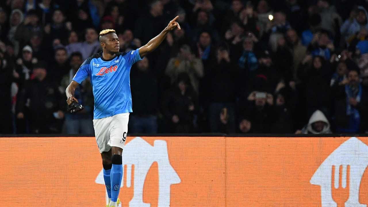 Napoli's Nigerian forward Victor Osimhen celebrates after opening the scoring during the UEFA Champions League round of 16. Credit: AFP Photo