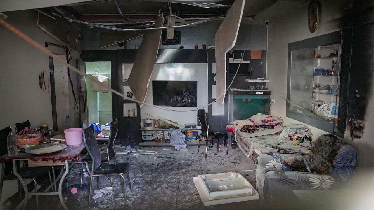 An inside view of a house where a gas pipeline exploded due to excavation work by water supply board workers in HSR layout, in Bengaluru, Thursday, March 16, 2023. Credit: PTI Photo