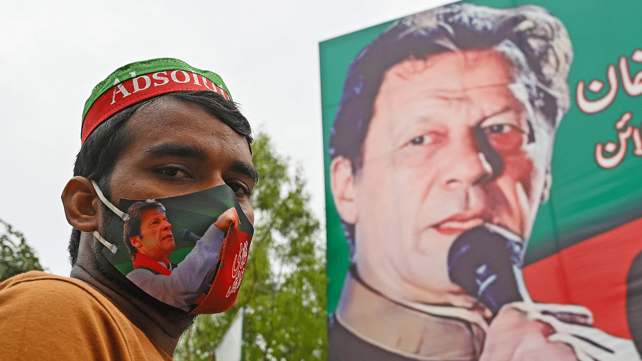 Attempts by police this week to arrest the 70-year-old former international cricket star in the eastern city of Lahore led to pitched battles with supporters outside his home. Credit: AFP Photo