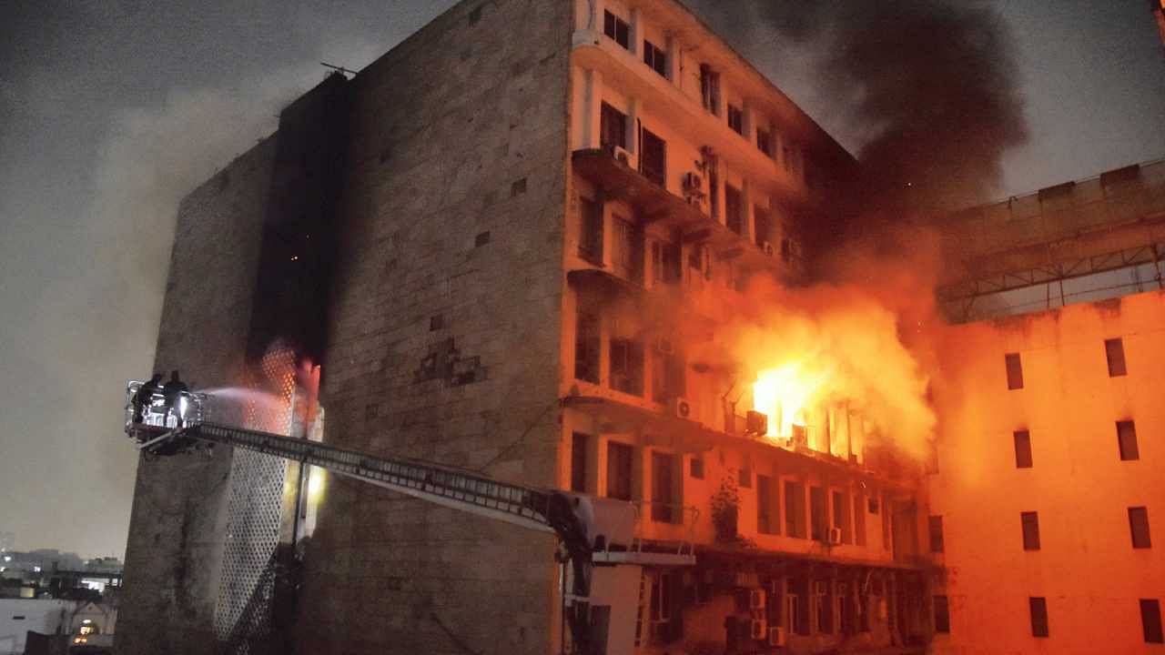 Firefighters douse a fire which broke out in Swapnalok Complex in Secunderabad, Hyderabad. Credit: PTI Photo