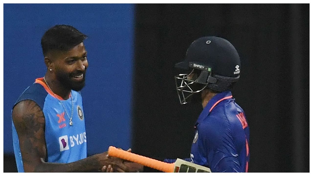 India's captain Hardik Pandya (L) shakes hands with Ravindra Jadeja at the end of the first one-day international (ODI) cricket match between India and Australia at the Wankhede Stadium in Mumbai on March 17, 2023. Credit: AFP Photo