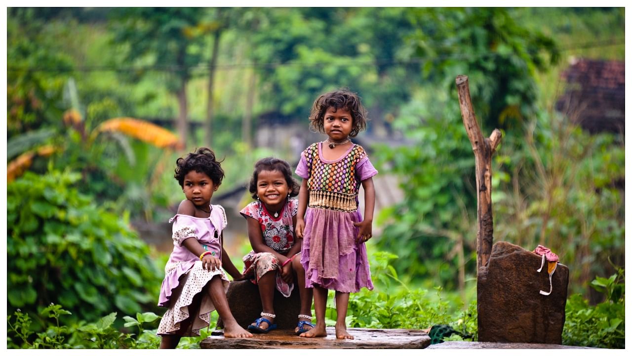 Group of children posing for the camera shot at Seeleru Forest Near Vishakapatnam. Credit: Getty Images